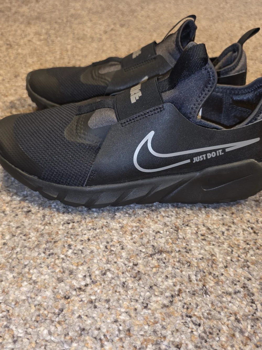 Nike Kids Black Slip-On Sneakers with Gray Swoosh